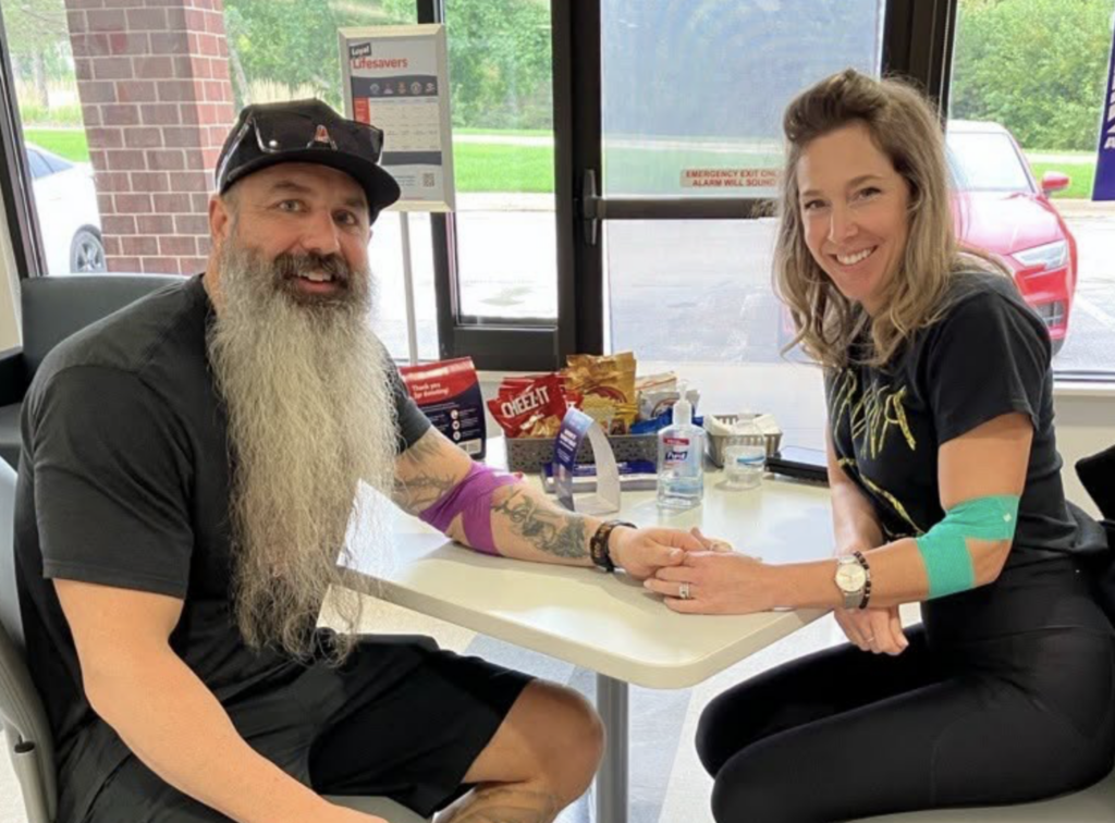 Christopher and Kristina donate blood